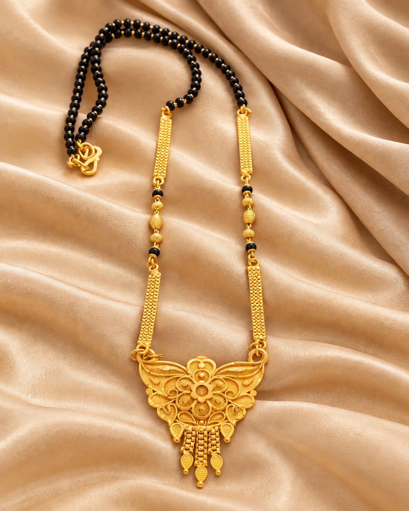 Traditional Gold Plated Black Beaded Mangalsutra with Intricate Butterfly Pendant