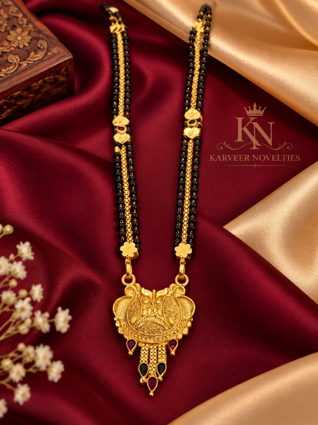 Traditional Gold Plated Ganesha Temple Necklace with Black Beads and Stone Accents